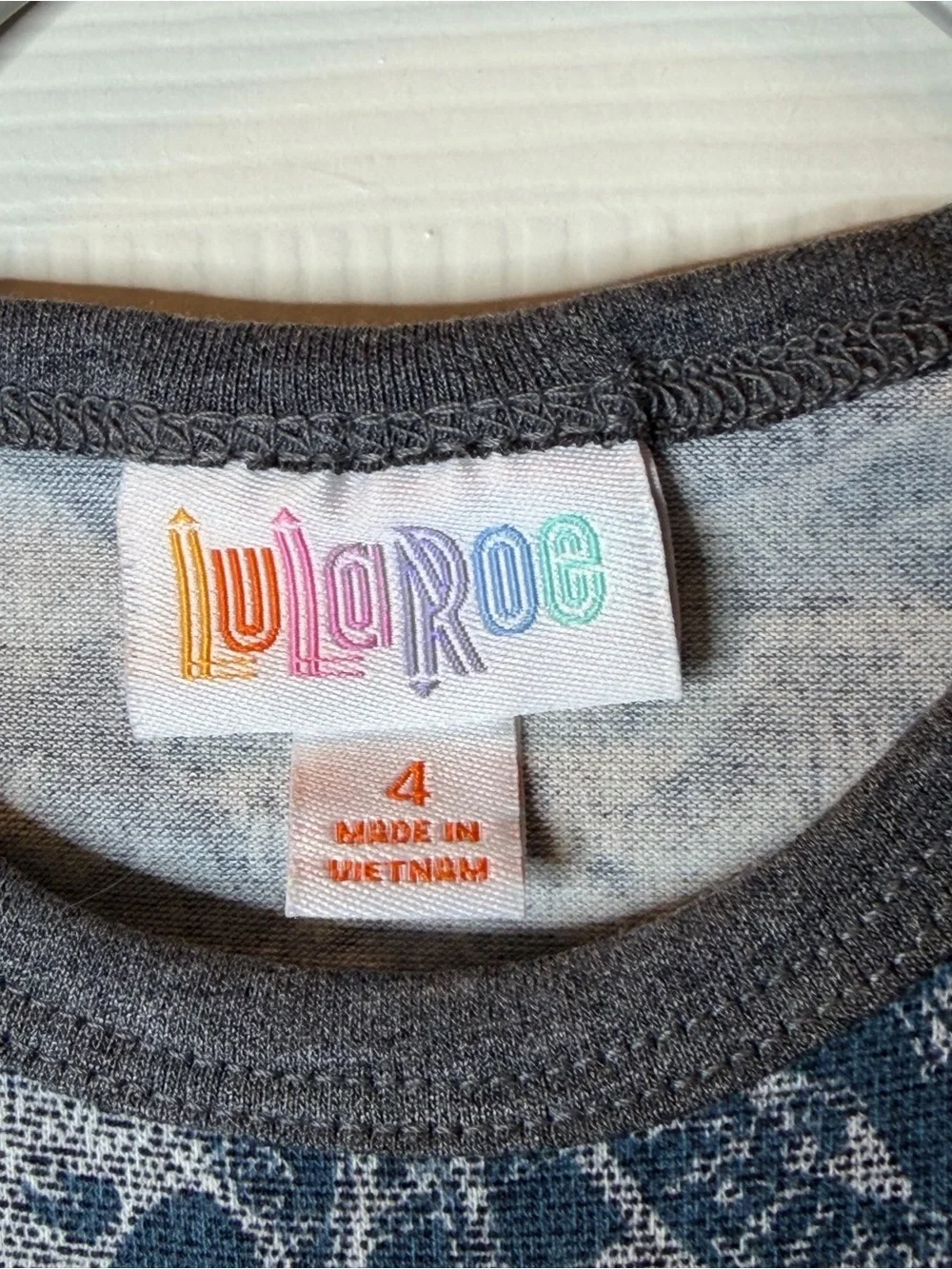 LuLaRoe Size 4 Disney Navy & Gray Short Sleeve Raglan Skull Tee